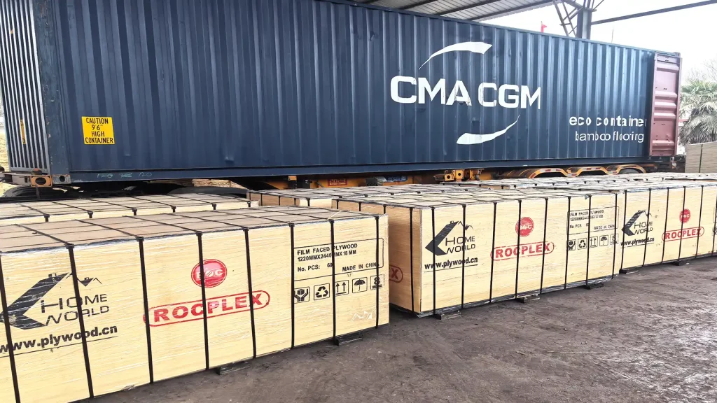 packed film faced plywood sheet bundles ready for export container loading